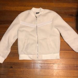 Zyia white Flying V fleece jacket